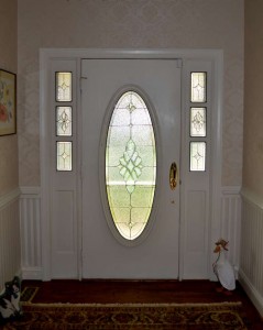 Traditional Grand Entryway Oval and sidelights   